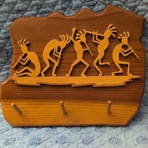 Artistic Brown Wall Hooks with Kokopelli Design